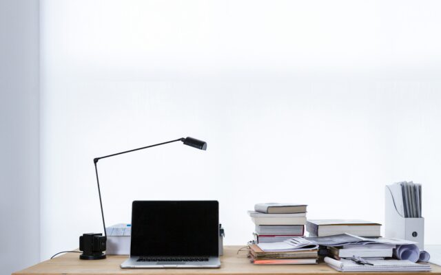 Publishing your book: desk with laptop and books